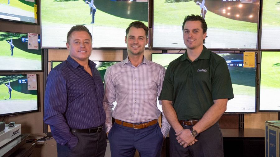 <who>Photo credit: Andre's</who>Andre's Electronic Experts owner Andre Blanleil, left, with his sons Kyle and Chad.