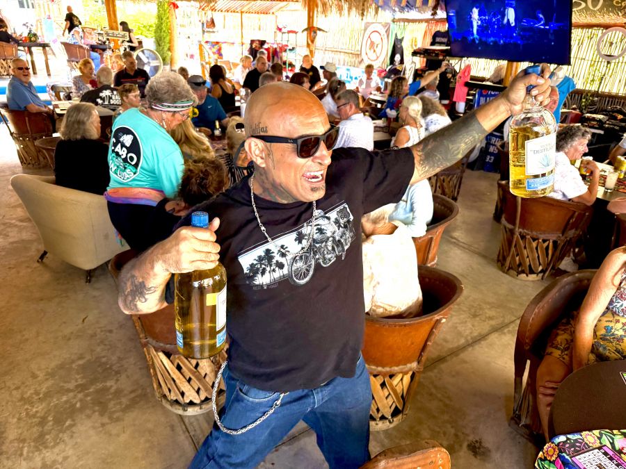 </who>Eduardo 'Fast Eddie' Buenrostro is the bingo caller and owner of Eddie's Bad Ass Tequila Tacos & Beer.